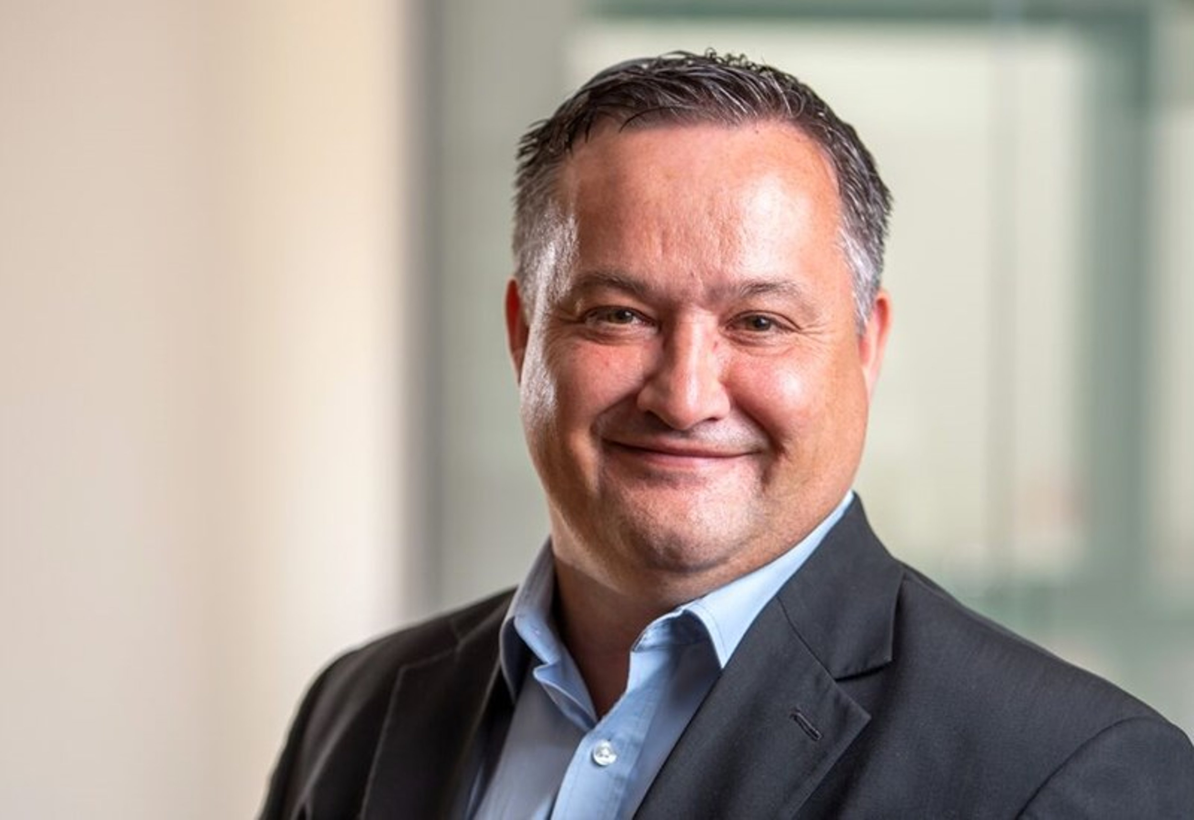 A headshot of Justin Bond